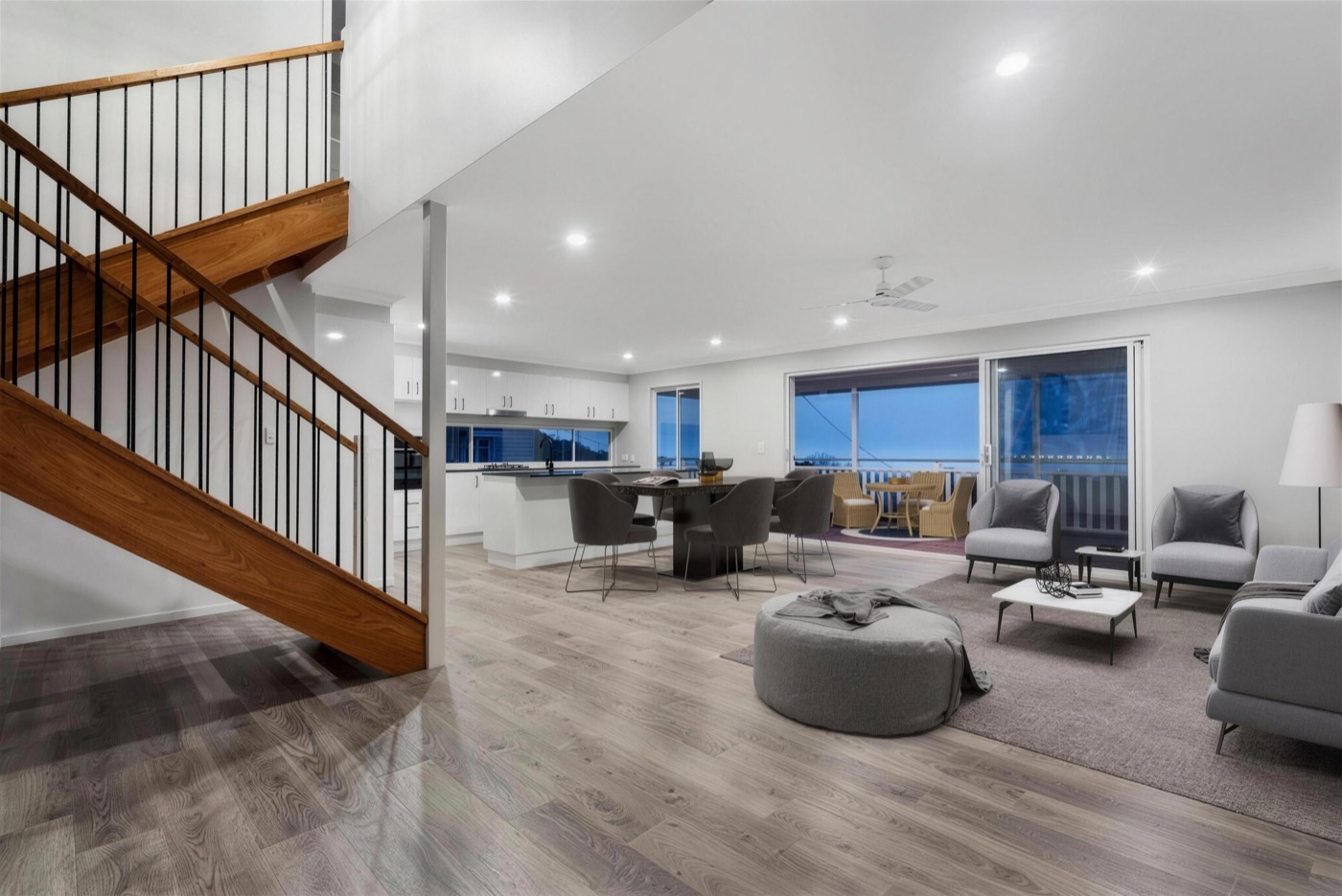 Open-plan living and timber staircase