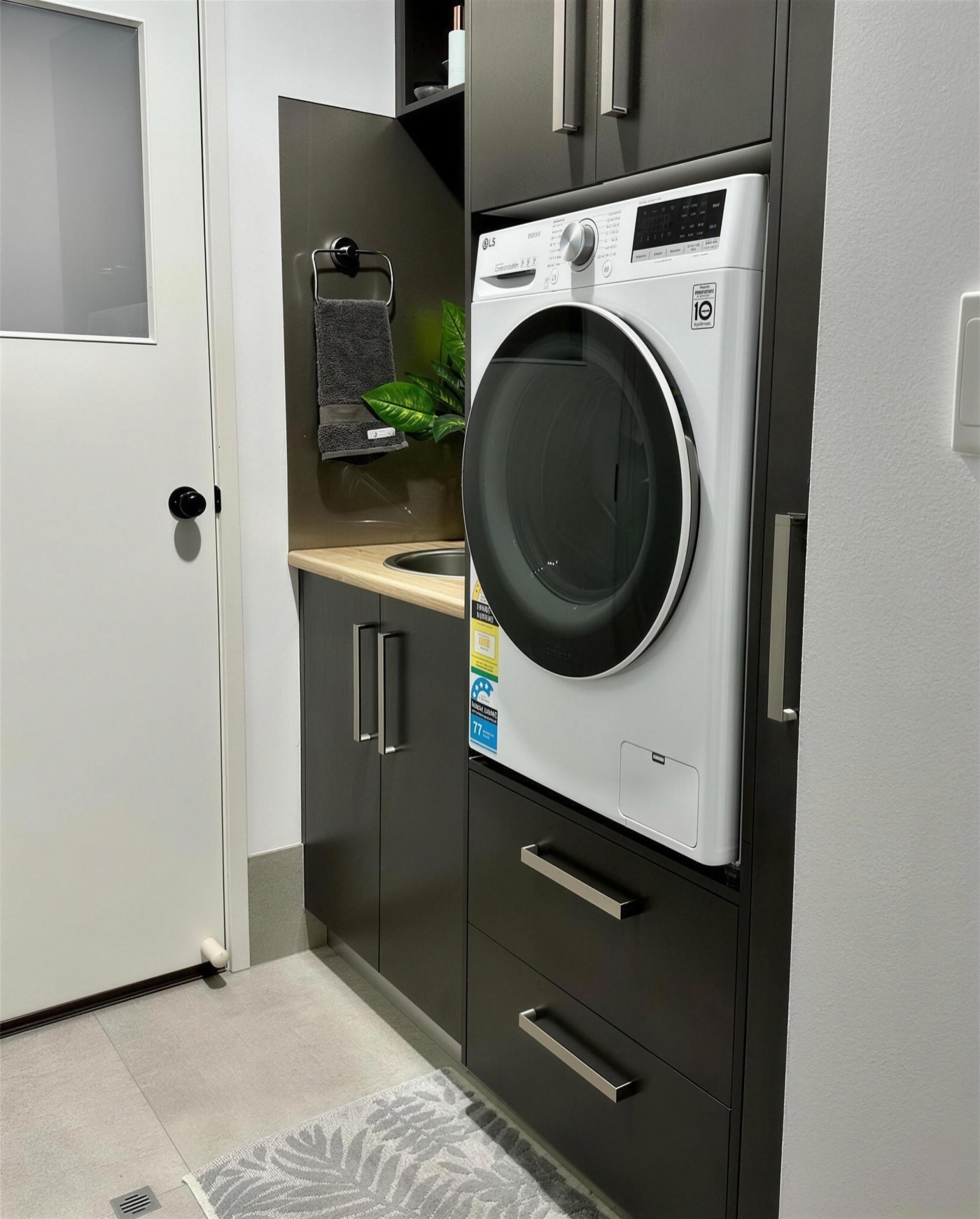 Custom laundry with cabinetry
