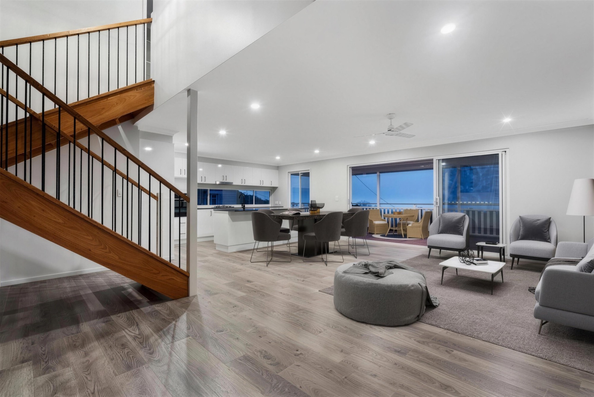 Open-plan living with timber staircase